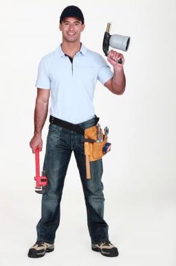 San Jose CA plumbing contractor poses with equipment